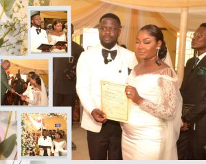 Ayomide and Abiodun with their wedding certificate